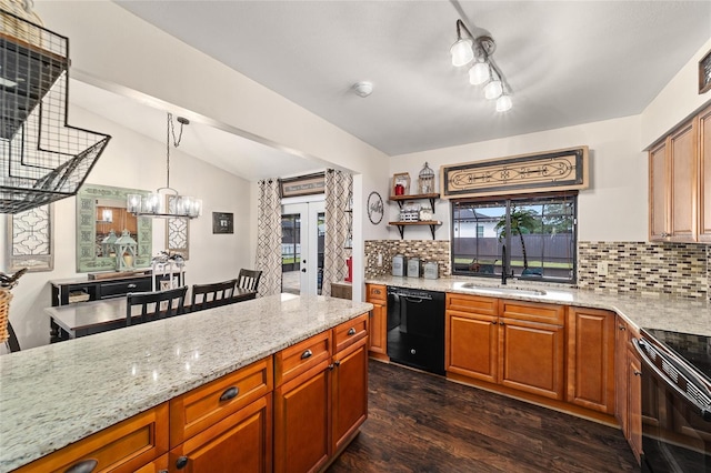 501 Marion Oaks Dr, Ocala, FL 34473 - kitchen with black appliances, decorative backsplash, vaulted ceiling, dark wood finished floors, and light stone counters