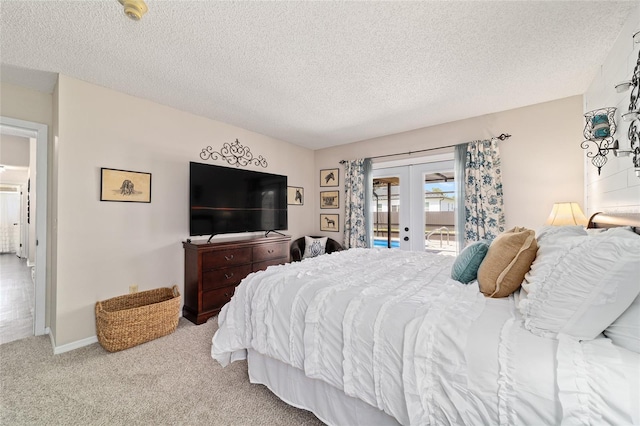 501 Marion Oaks Dr, Ocala, FL 34473 - carpeted bedroom featuring french doors, access to exterior, and a textured ceiling