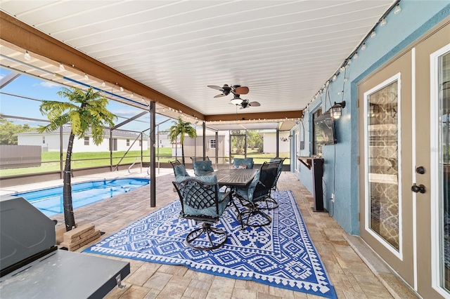 501 Marion Oaks Dr, Ocala, FL 34473 - sunroom / solarium featuring a ceiling fan, track lighting, and outdoor dining area