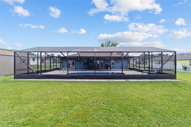 501 Marion Oaks Dr, Ocala, FL 34473 - back of house with an outdoor pool, a lawn, glass enclosure, and a patio area