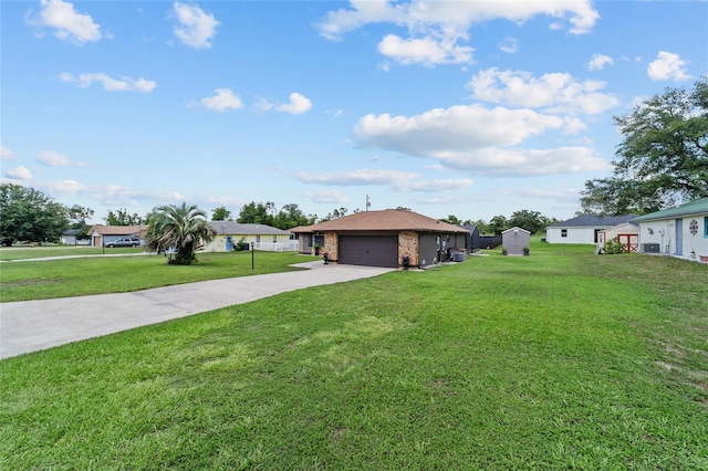 501 Marion Oaks Dr, Ocala, FL 34473 - view of grassy yard with concrete driveway, a garage, and a residential view