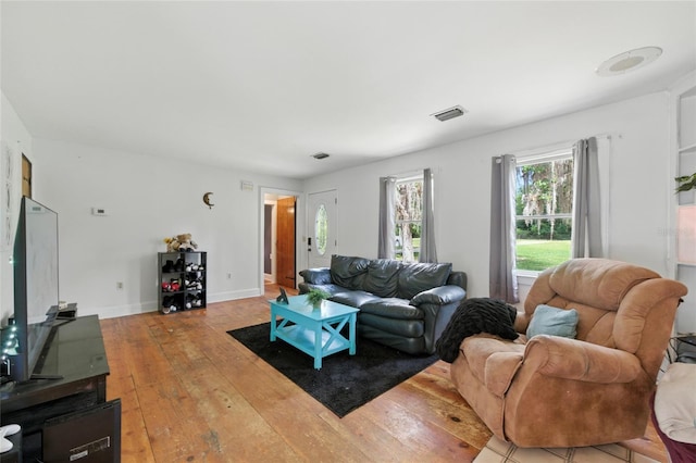 5693 Payette Ave, Keystone Heights, FL 32656 - living room featuring light wood finished floors and baseboards