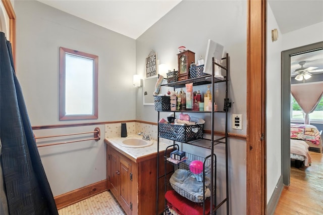 5693 Payette Ave, Keystone Heights, FL 32656 - bathroom with vanity, a ceiling fan, and ensuite bath