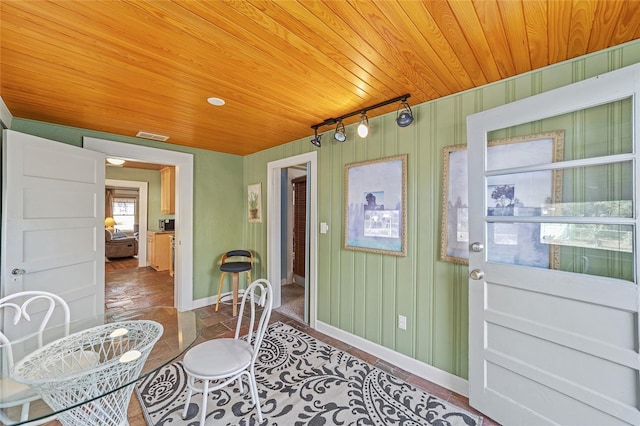 114 NE 11th Ave, Ocala, FL 34470 - foyer with wooden ceiling and track lighting