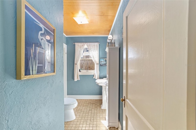 114 NE 11th Ave, Ocala, FL 34470 - bathroom with toilet and a textured wall