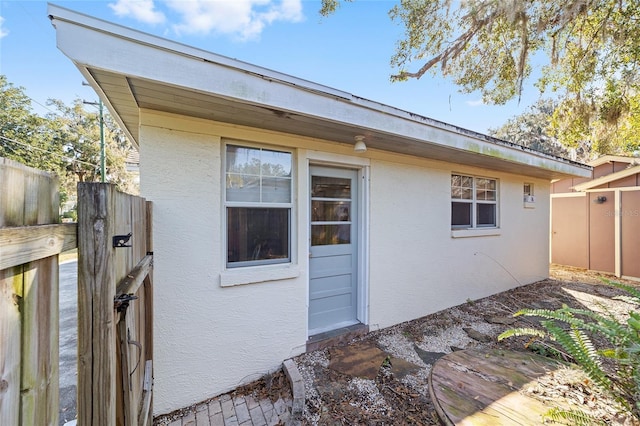 114 NE 11th Ave, Ocala, FL 34470 - view of home's exterior with stucco siding