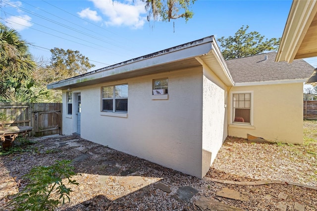 114 NE 11th Ave, Ocala, FL 34470 - view of home's exterior featuring stucco siding