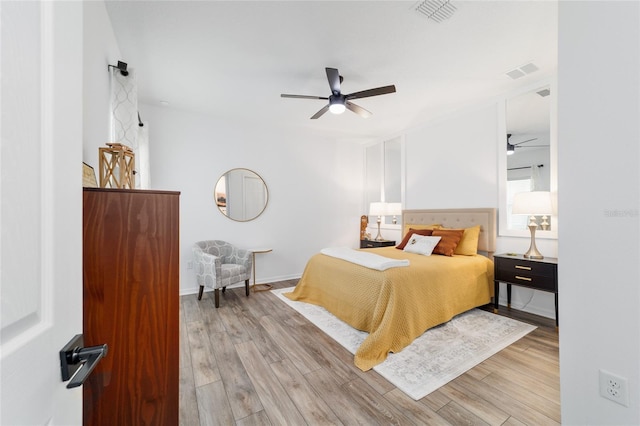 9746 SW 108th Terrace Rd, Ocala, FL 34481 - bedroom featuring wood finished floors and ceiling fan