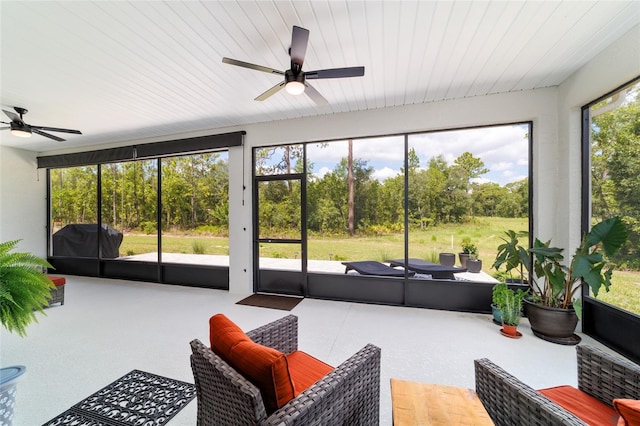 9746 SW 108th Terrace Rd, Ocala, FL 34481 - sunroom with a ceiling fan and outdoor lounge area