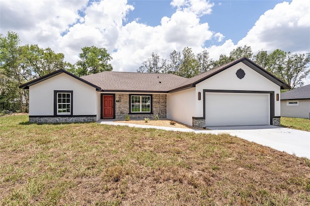 28 Water Track Dr, Ocala, FL 34472 - single story home featuring stone siding, an attached garage, stucco siding, and driveway