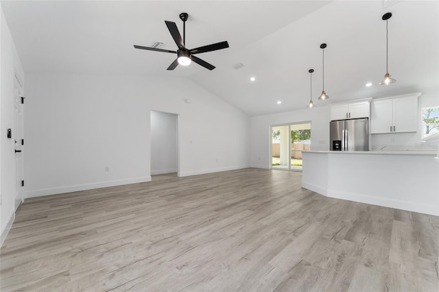 28 Water Track Dr, Ocala, FL 34472 - unfurnished living room with lofted ceiling, recessed lighting, ceiling fan, and light wood finished floors