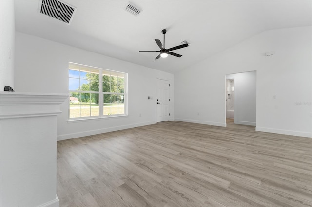 28 Water Track Dr, Ocala, FL 34472 - unfurnished living room with vaulted ceiling, a ceiling fan, and light wood-style flooring