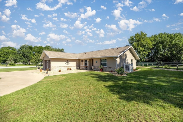 7443 SW 102nd Pl, Ocala, FL 34476 - ranch-style home with stucco siding, driveway, and a garage