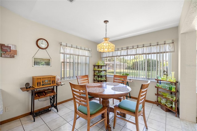 7443 SW 102nd Pl, Ocala, FL 34476 - dining room with healthy amount of natural light and light tile patterned floors