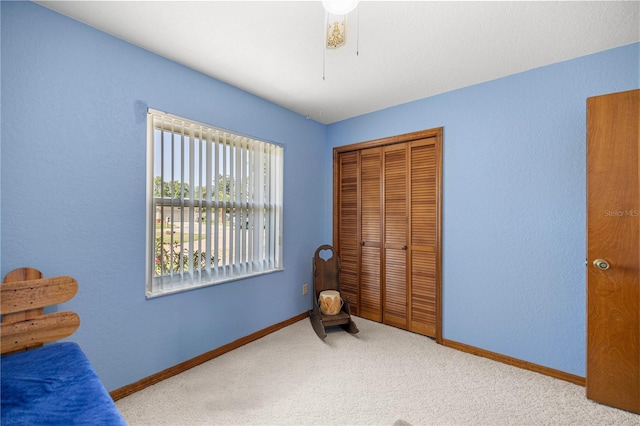 7443 SW 102nd Pl, Ocala, FL 34476 - bedroom featuring carpet flooring, a closet, and ceiling fan