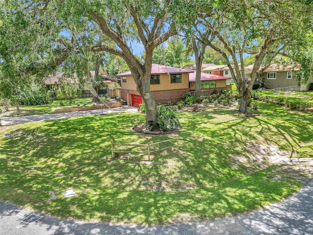 2676 SE 52nd Ave, Ocala, FL 34480 - view of front of property with a garage, brick siding, and a residential view