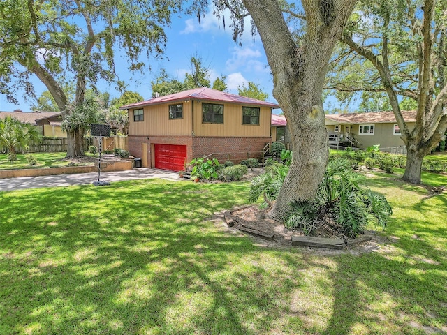 2676 SE 52nd Ave, Ocala, FL 34480 - view of front of property featuring brick siding, an attached garage, and concrete driveway