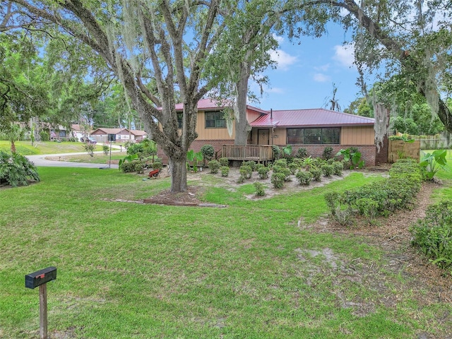 2676 SE 52nd Ave, Ocala, FL 34480 - view of front of house featuring a metal roof
