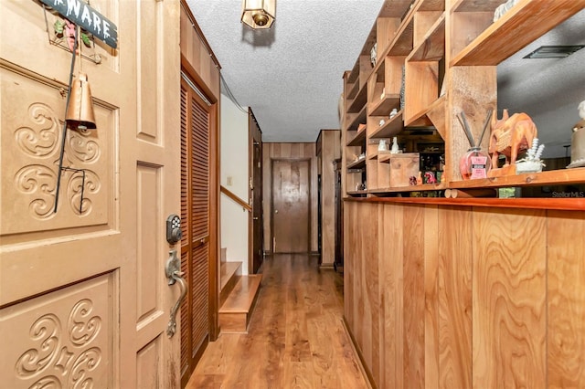 2676 SE 52nd Ave, Ocala, FL 34480 - welcome area featuring a textured ceiling and stairway