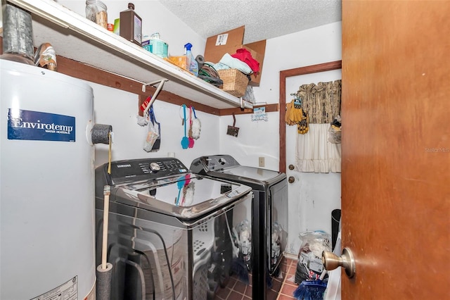 2676 SE 52nd Ave, Ocala, FL 34480 - washroom with gas water heater, washer and clothes dryer, and tile patterned flooring