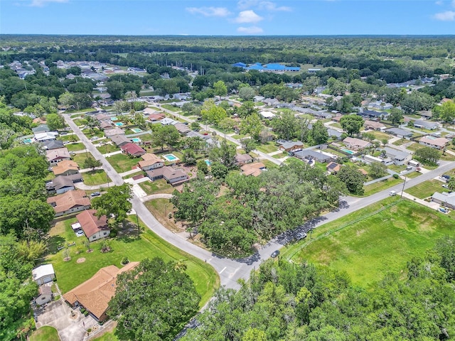 2676 SE 52nd Ave, Ocala, FL 34480 - aerial view of property and surrounding area with nearby suburban area
