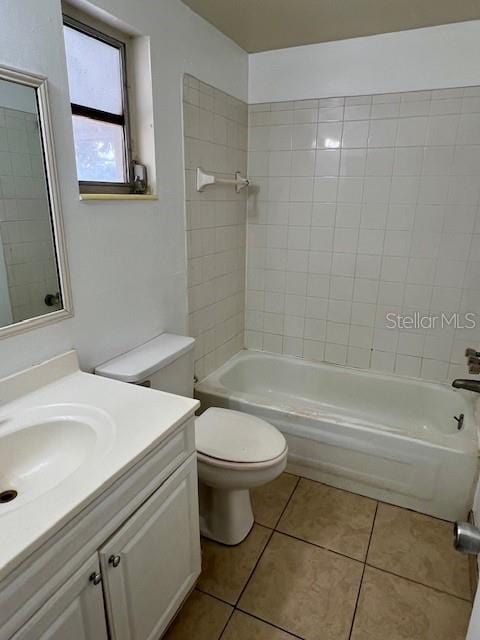 3801 SW 147th Lane Rd, Ocala, FL 34473 - full bathroom featuring vanity, tile patterned flooring, and shower / bath combination