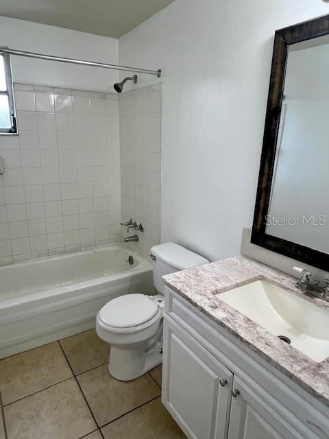 3801 SW 147th Lane Rd, Ocala, FL 34473 - bathroom featuring vanity, tile patterned flooring, and bathtub / shower combination