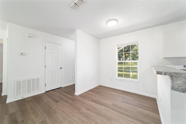 5596 NW 57th St, Ocala, FL 34482 - unfurnished dining area featuring wood finished floors and baseboards