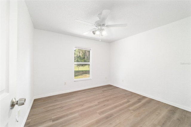5596 NW 57th St, Ocala, FL 34482 - empty room with light wood-style flooring and ceiling fan
