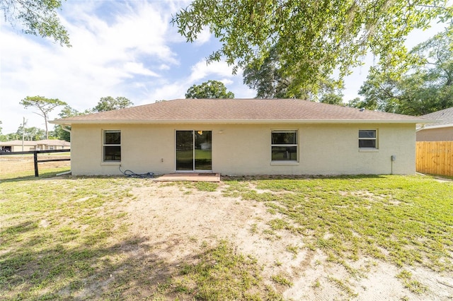 5596 NW 57th St, Ocala, FL 34482 - back of property featuring stucco siding