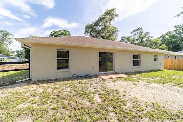 5596 NW 57th St, Ocala, FL 34482 - back of property featuring stucco siding