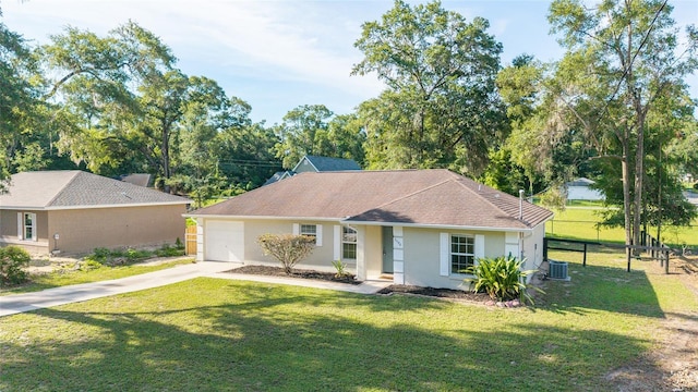 5596 NW 57th St, Ocala, FL 34482 - ranch-style home featuring concrete driveway, a front lawn, and stucco siding
