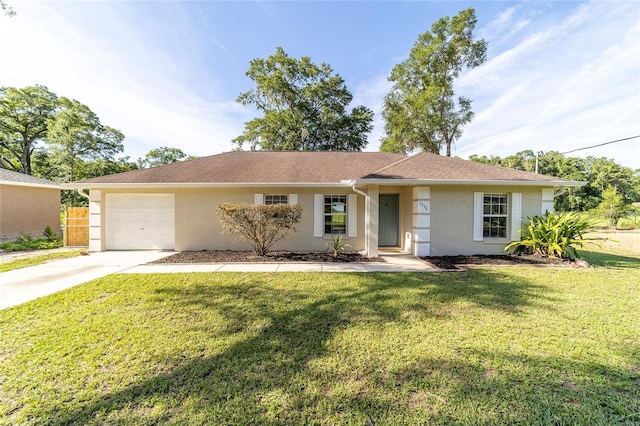 5596 NW 57th St, Ocala, FL 34482 - single story home with an attached garage, concrete driveway, a front yard, and stucco siding