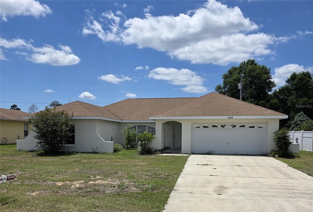 15084 SW 28th Terrace Rd Unit 3, Ocala, FL 34473 - ranch-style house with stucco siding, a garage, concrete driveway, and roof with shingles