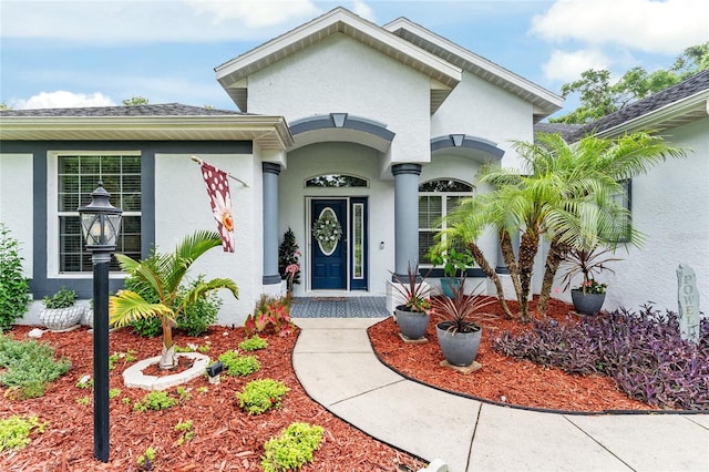 19115 SW 98th Loop, Dunnellon, FL 34432 - property entrance featuring stucco siding