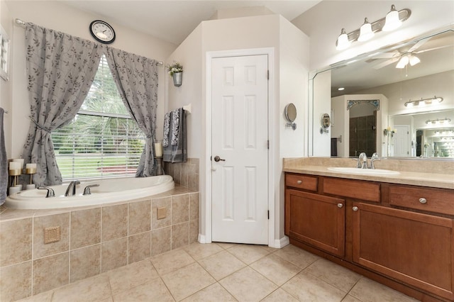 19115 SW 98th Loop, Dunnellon, FL 34432 - full bath with tile patterned flooring, vanity, a garden tub, and ceiling fan