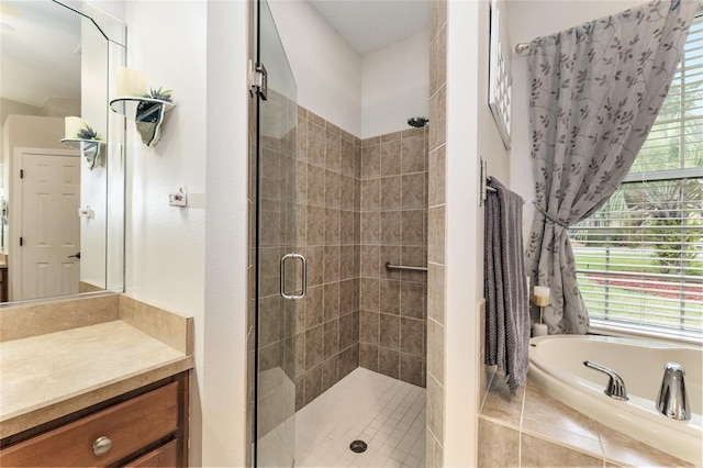19115 SW 98th Loop, Dunnellon, FL 34432 - bathroom with a stall shower, a bath, and vanity