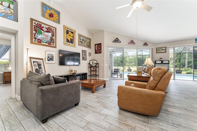 19115 SW 98th Loop, Dunnellon, FL 34432 - living room with ceiling fan, wood finish floors, and high vaulted ceiling