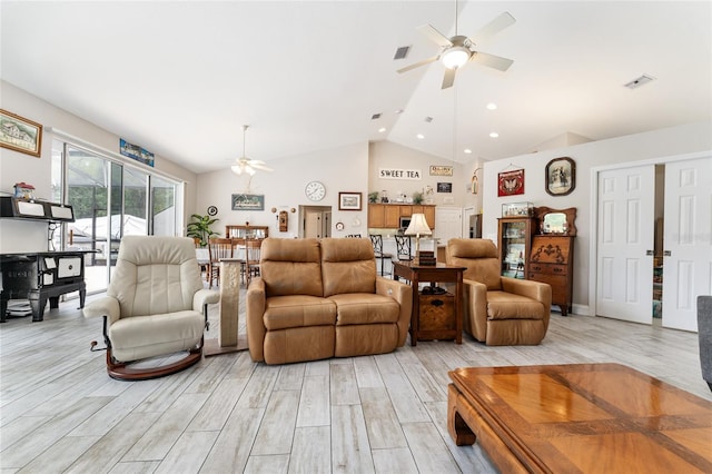 19115 SW 98th Loop, Dunnellon, FL 34432 - living room with a ceiling fan, light wood finished floors, high vaulted ceiling, and recessed lighting