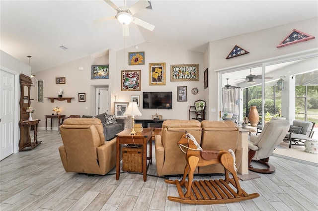 19115 SW 98th Loop, Dunnellon, FL 34432 - living room featuring a ceiling fan, light wood-type flooring, and high vaulted ceiling