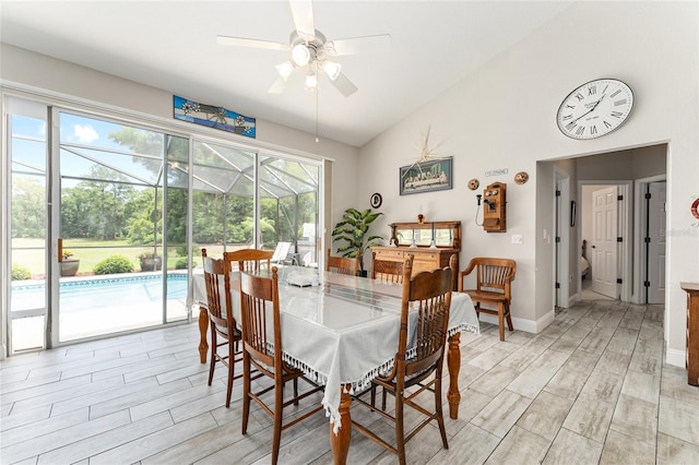 19115 SW 98th Loop, Dunnellon, FL 34432 - dining room with light wood-type flooring, ceiling fan, a sunroom, and high vaulted ceiling