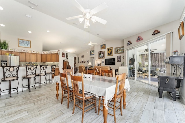 19115 SW 98th Loop, Dunnellon, FL 34432 - dining room featuring a ceiling fan, light wood finished floors, recessed lighting, and high vaulted ceiling
