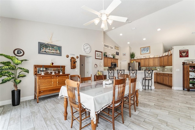 19115 SW 98th Loop, Dunnellon, FL 34432 - dining area featuring high vaulted ceiling, light wood-style floors, a ceiling fan, and recessed lighting