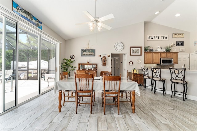 19115 SW 98th Loop, Dunnellon, FL 34432 - dining area featuring high vaulted ceiling, light wood-style floors, and a ceiling fan