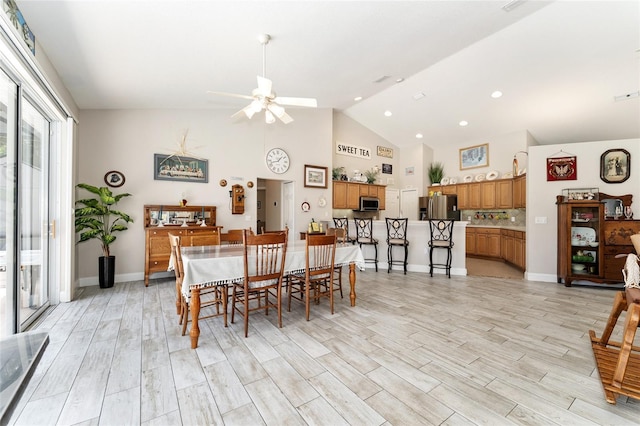 19115 SW 98th Loop, Dunnellon, FL 34432 - dining space with a ceiling fan, light wood-type flooring, recessed lighting, and high vaulted ceiling