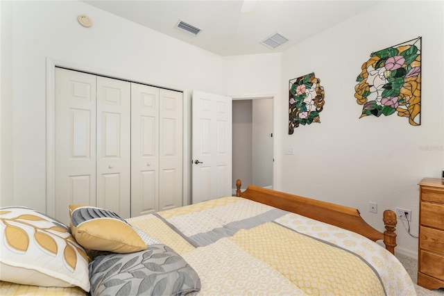 19115 SW 98th Loop, Dunnellon, FL 34432 - carpeted bedroom featuring a closet and ceiling fan