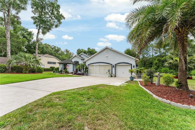 19115 SW 98th Loop, Dunnellon, FL 34432 - ranch-style house with concrete driveway, a front lawn, stucco siding, and an attached garage