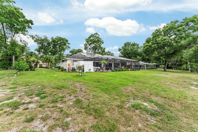 19115 SW 98th Loop, Dunnellon, FL 34432 - view of green lawn featuring glass enclosure