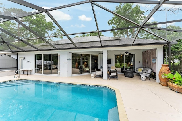 19115 SW 98th Loop, Dunnellon, FL 34432 - swimming pool featuring an outdoor hangout area, a ceiling fan, and a patio