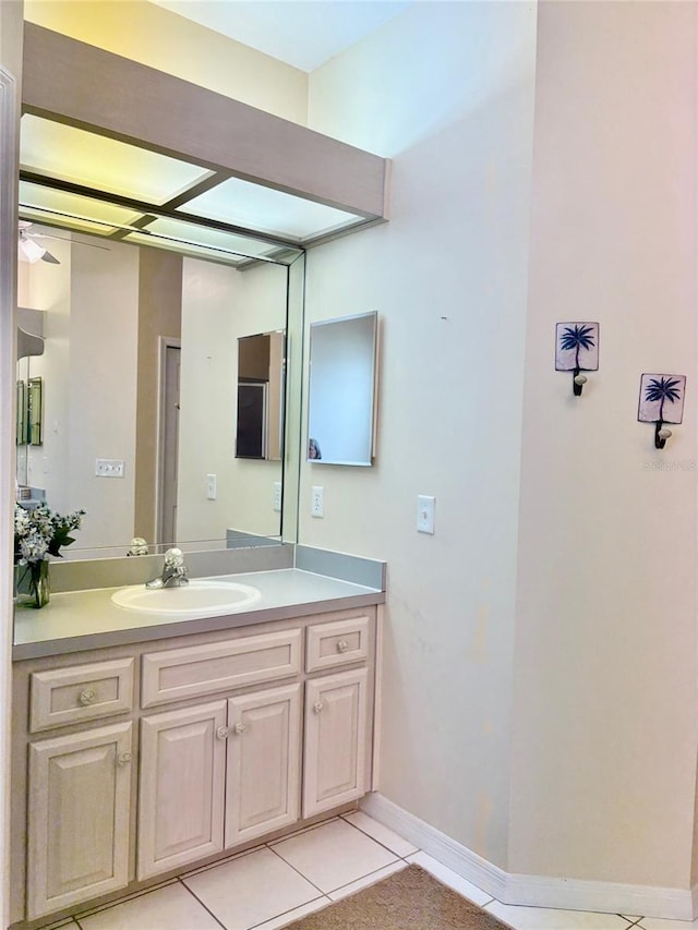 19480 SW 100th Loop, Dunnellon, FL 34432 - bathroom with vanity, tile patterned floors, and ceiling fan